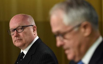 Attorney-General George Brandis (left), who has said people have a "right to be bigots", with Prime Minister Malcolm Turnbull. Photo: AAP Image/Dan Himbrechts