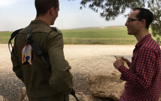 Nathan Jeffay (right) being briefed by an IDF captain on the Gaza border.