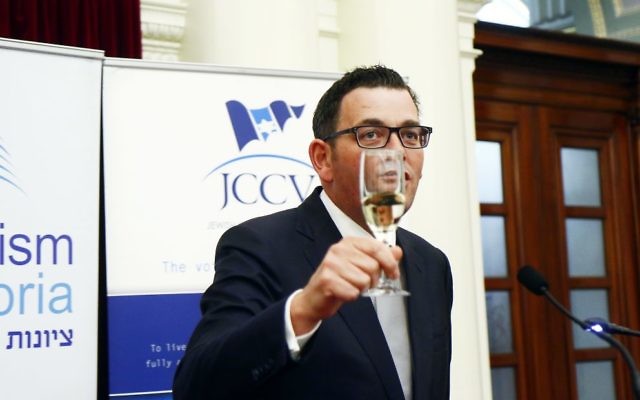 Daniel Andrews raises a glass to Israel at Parliament House last week. Photo: Peter Haskin