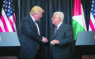Donald Trump with Mahmoud Abbas in Bethlehem last week. 
Photo: Issam Rimawi/Anadolu Agency/Getty Images