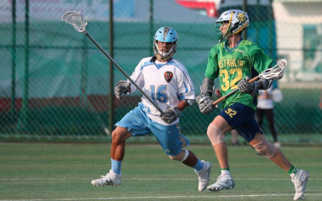 Australian lacrosse player Liam Harari plays against the Taiwanese team in South Korea last week. Photo: Liss Ralston