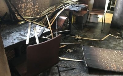 Damage to the JS restaurant after the arson attack Photo credit: Steven Allen