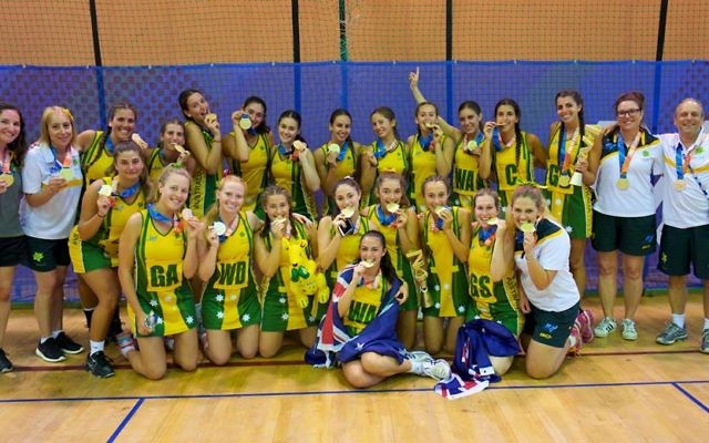 Australia's junior and open netball teams celebrate winning gold medals at the 2017 Maccabiah Games in Israel.