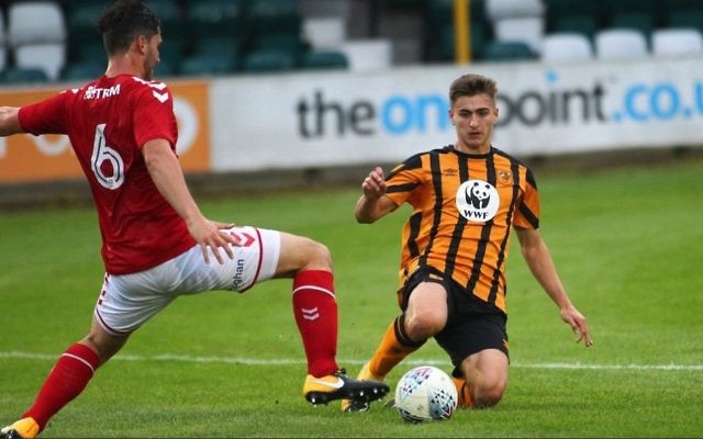 Charlton Athletic U23s player Ryan Blumberg (left) challenges for the ball against Hull City.