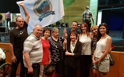 Rita Migdal (centre) with family at the 70 Year Exodus Commemoration in Haifa last week.