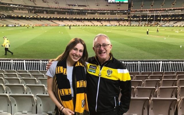 Tony Greenberg (right) supporting the Tigers with his daughter Emily.