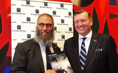 Rabbi Mendel Kastel (left) and Lifeline Australia chairman John Brogden presenting the 2017 Ending Homelessness Report to NSW Parliament.