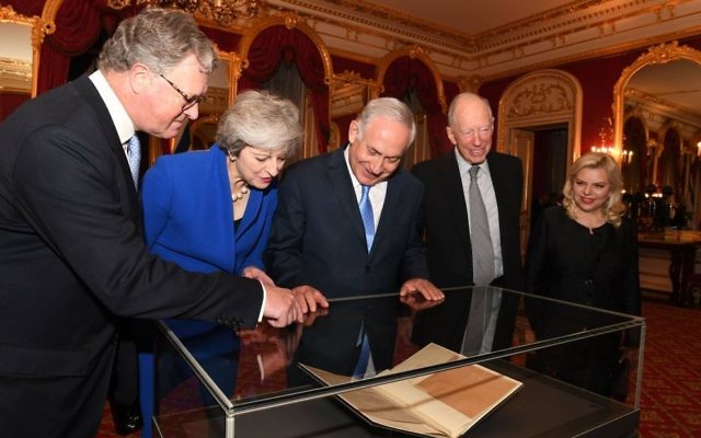 Israel's Prime Minister Benjamin Netanyahu and his wife Sara, with British Prime Minister Theresa May and Lords Balfour and Rothschild view the original Balfour Declaration. Photo: Kobi Gideon, GPO