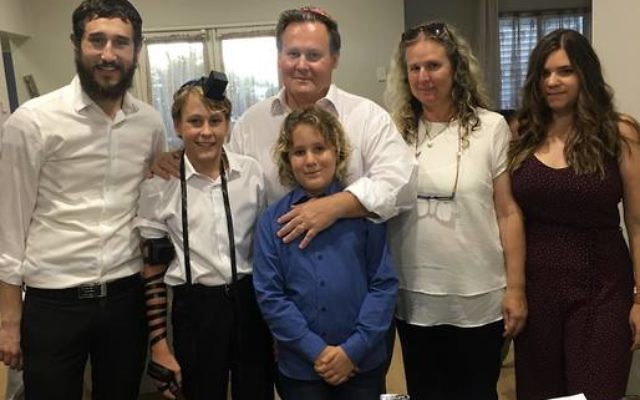 From left: Rabbi Ari Rubin and Barnabas Sarnyai with his father Zoltan, brother Benjamin, mother Katie, and sister Anna.