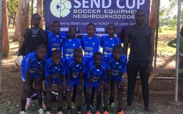 The junior team at Wire Soccer Academy in Oyugis, Kenya, wearing the donated Maccabi Hakoah Junior Football Club shorts and shirts at a tournament this month.