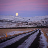 Lori Gross entered this photo taken as the sun rises and the moon sets over the mountains of Southern Iceland.