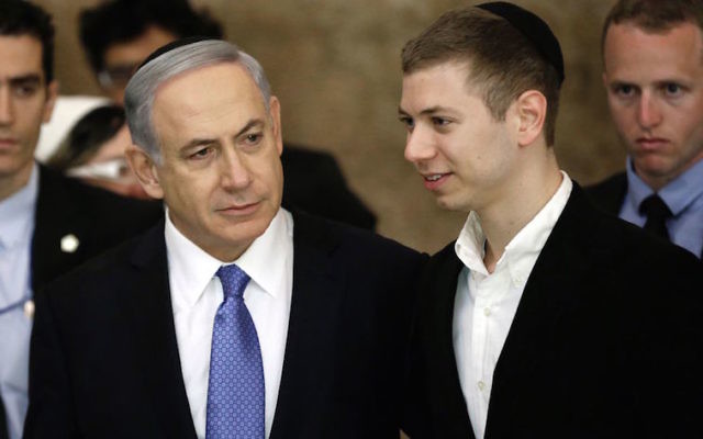 Israeli Prime Minister Benjamin Netanyahu (left) and his son Yair in 2015. Photo: Thomas Coex/Getty Images