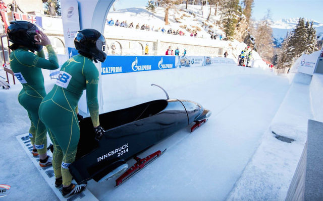 Ashleigh Werner (left) and Australian teammate Bree Walker at the start line at the 2018 Women's Bobsleigh Junior World Championships at St Moritz, France.