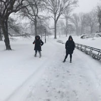 Racheli Shnider and friends in snowy Central Park, New York.