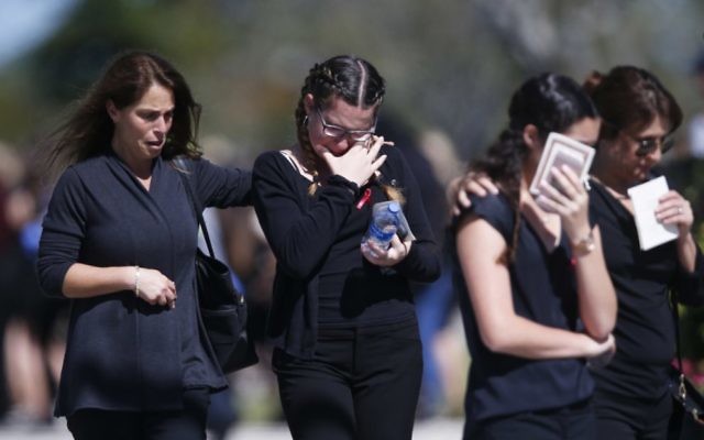 Mourners at the funeral of Alyssa Alhadeff. Photo: AP Photo/Brynn Anderson