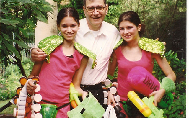 Professor David Cooper with daughters Ilana and Becky dressed as pills fighting HIV for the 1999 Mardi Gras.