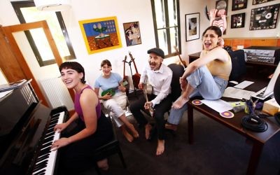 Musician Willy Zygier and daughters (from left) Syd, Hettie and Alma rehearse in preparation for the YID! concerts at In One Voice. Photo: Peter Haskin
