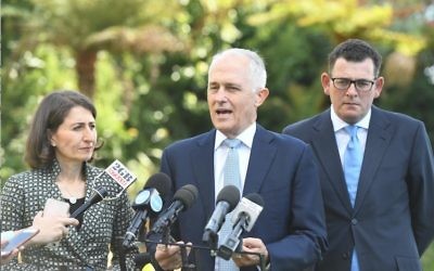 Premiers Gladys Berejiklian and Daniel Andrews joined Prime Minister Malcolm Turnbull to announce NSW and Victoria were signing up to the redress scheme. Photo: AAP Image/Dean Lewins