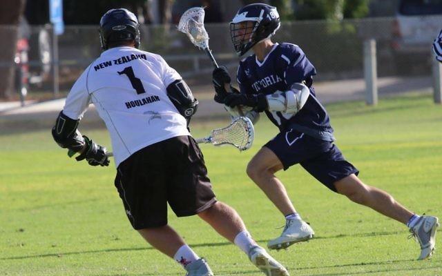 Liam Harari (right) in action for Victoria last weekend. Photo: Lacrosse Pix