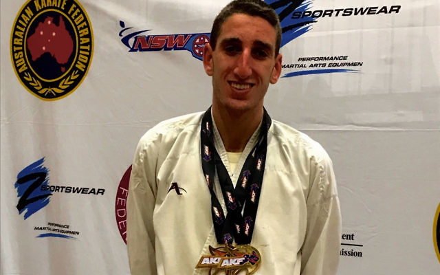 Yonatan Freund with his two gold medals at the 2018 Karate Australian Open.