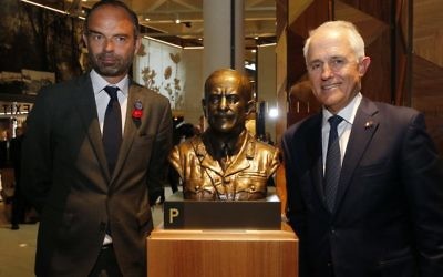 French PM Edouard Philippe (left) and Australian PM Malcolm Turnbull with a bust of General Sir John Monash at the opening of the Sir John Monash Centre. Photo: Pascal Rossignol, Pool via AP