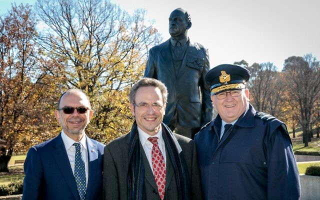 From left, Rabbi Ralph Genende, Michael Bennett, Monash's great-grandson, and Air Commodore Mark Willis in front of the sculpture. Photo: David Whittaker
