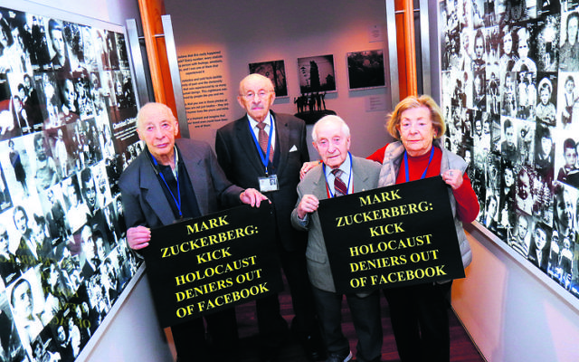 Survivors at the Jewish Holocaust Centre in Melbourne protesting against Facebook. From left: Joseph De Haan, David Prince, Abe Goldberg and Lusia Haberfeld. Photo: Peter Haskin