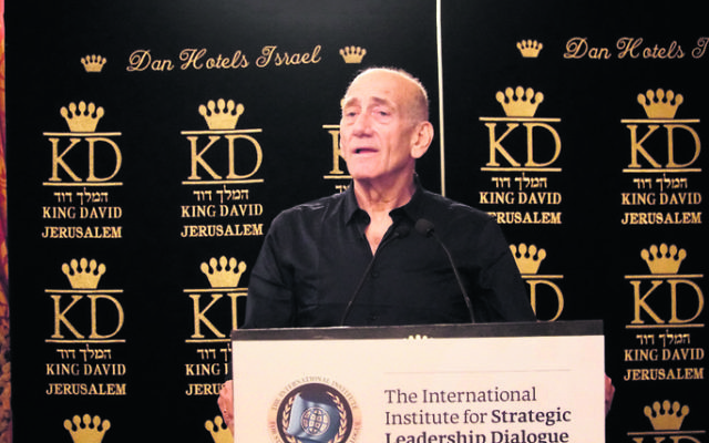 Ehud Olmert addressing the Strategic Leadership Dialogue gala dinner.
Photo: Shahar Zarfati