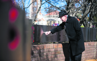 Jules Hoffman points to his brother Adolf's name on the National Jewish War Memorial. Photo: Dion Georgopoulos
