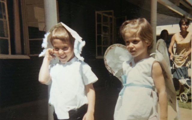 The author in her childhood, dressed as an angel for the school nativity play, with her twin brother Gavin.