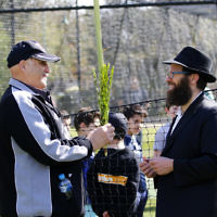 30-9-18. Legendary Jewish batsman Michael Klinger visited Maccabi Junior cricket training at Caulfield Park. And a bit of lulav and etrog for Succot. Photo: Peter Haskin