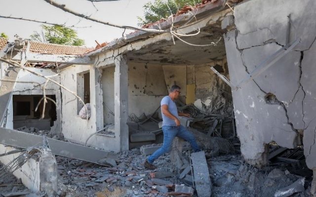 A home in the southern Israeli city of Ashkelon was destroyed by a rocket fired from Gaza. Photo: Nati Shohat/Flash90
