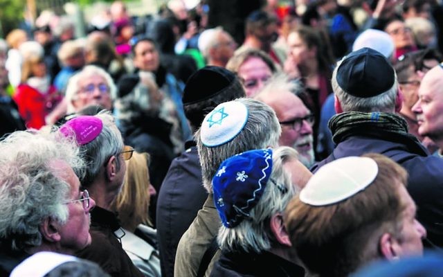 Participants wearing kippahs at a rally in Berlin, April 25, 2018. Photo: Carsten Koall/Getty Images