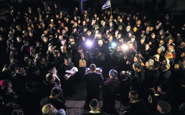 Mourners at the funeral of Amiad, the baby of Amichai and Shira Ish-Ran. Photo: EPA/Yonatan Sindel