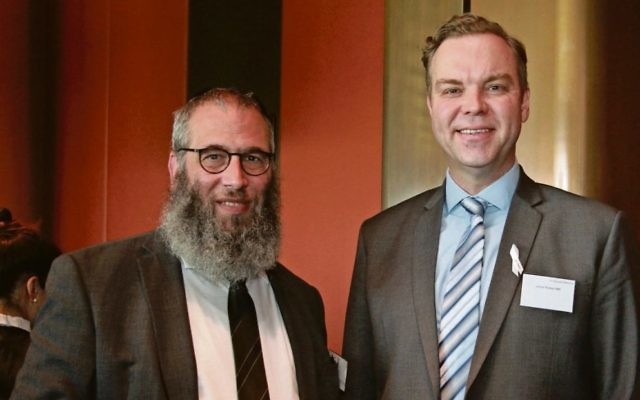 Jamie Parker (right) with Rabbi Mendel Kastel at the NSW Parliament
Chanukah event in 2016. Photo: Shane Desiatnik