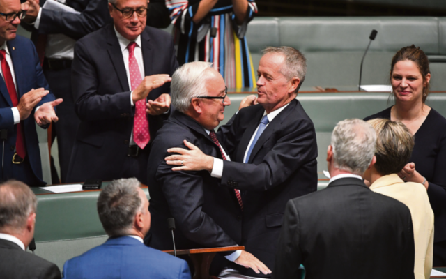 Applause for Michael Danby and an embrace from Opposition Leader Bill
Shorten last week. Photo: AAP Image/Mick Tsikas