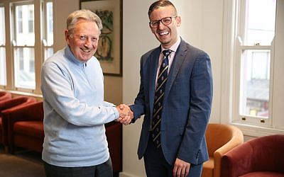 Robotic coronary bypass patient Dr Harry Johnson (left) reunites with his
surgeon and good friend Dr Levi Bassin late last month.