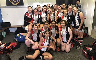 Sam Hall (in the first row on the far right) celebrates last Saturday’s win
with her AJAX teammates.