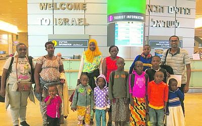 The Rwandan children and their
carers arriving at Ben Gurion Airport.