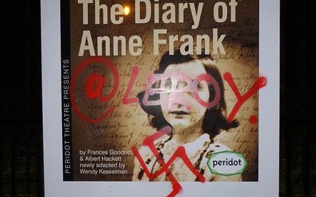 The promotional poster for the production of The Diary of Anne Frank defaced with a swastika.