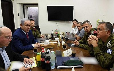 Prime Minister Benjamin Netanyahu (2nd R) meets, following a rocket attack from Gaza, with his defence chiefs at the Kirya military base in Tel Aviv on September 10, 2019 (Ariel Hermoni/Defence Ministry)