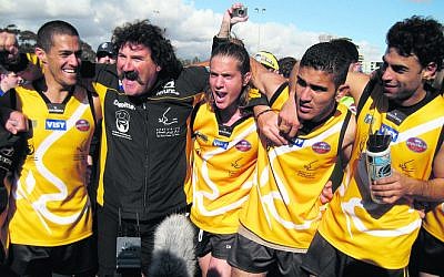 AFL legend Robert DiPierdomenico
with members of the first
International Peace Team in 2008.