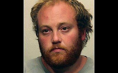 This undated booking photo from the St. Louis (Minnesota) County Sheriff’s Office shows Matthew James Amiot, who was arrested, Sept. 13, 2019, in connection to a fire at the Adas Israel Congregation, in Duluth, Minn. (St. Louis (Minnesota) County Sheriff’s Office via AP)