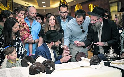 From left: Asher Lizor, Ella Lizor, Sharon Hendler, Talia Lizor, Nir Lizor, Orna Triguboff, Rabbi Shlomo Israel (seated), Daniel Hendler, Ariel Hendler, Rabbi Dr Dovid Slavin.