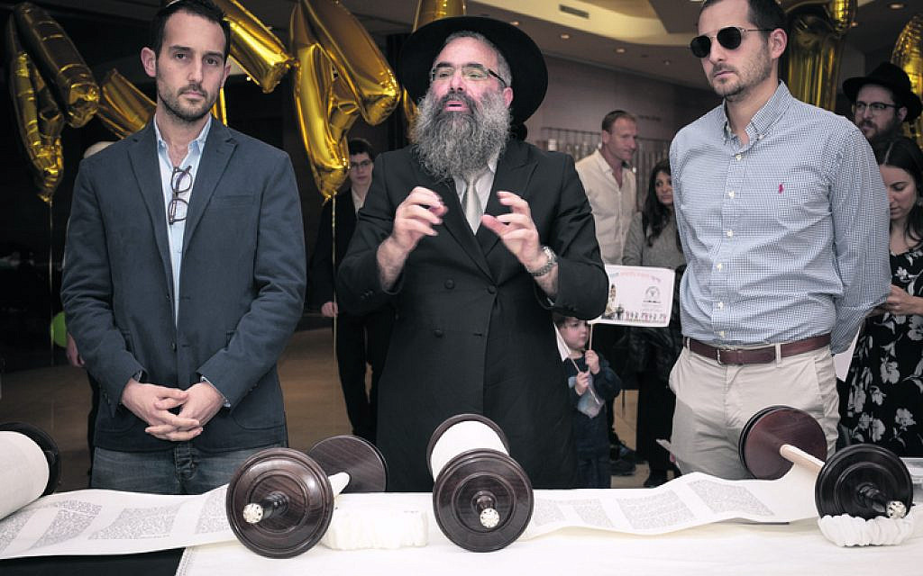 From left: Daniel Hendler, Rabbi Dr Dovid Slavin, Ariel Hendler.