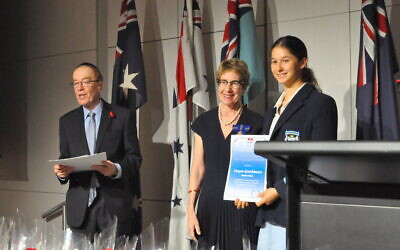 NAJEX president Roger Selby (left) and NSW Governor Margaret Beazley presenting a NAJEX Youth Award to Maya Goodman. Photo: Ian Lever.