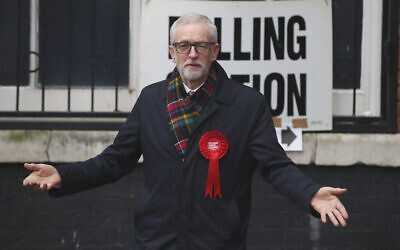 British opposition Labour Party leader Jeremy Corbyn, gestures after casting his vote in the general election, in Islington, London, England, December 12, 2019. (AP Photo/Thanassis Stavrakis)