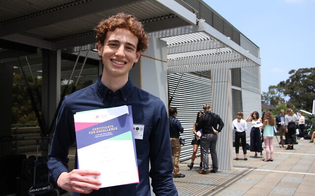 Adam Gottschalk with his First in Course certificates. Photo: Shane Desiatnik