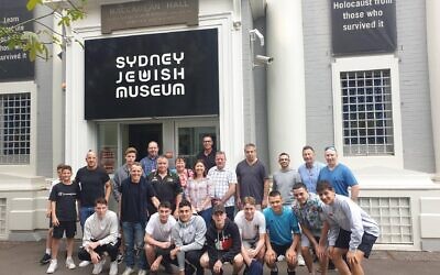 Mount Druitt Football Club players, parents and board members together with
Hakoah Football Club board members outside the Sydney Jewish Museum.