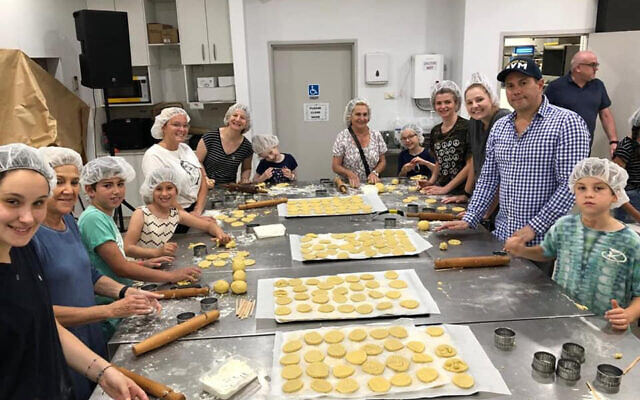 Baking cookies for firies and victims at Our Big Kitchen